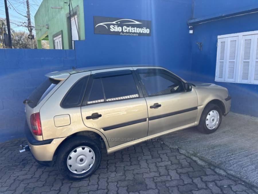 VOLKSWAGEN - GOL - 2002/2003 - Bege - R$ 24.500,00