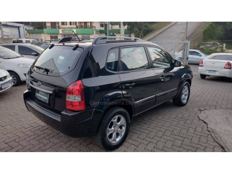 HYUNDAI - TUCSON - 2010/2011 - Preta - R$ 43.500,00