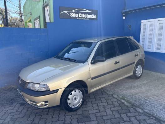 VOLKSWAGEN - GOL - 2002/2003 - Bege - R$ 24.500,00