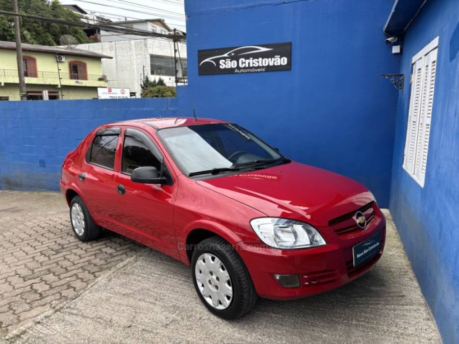CHEVROLET - PRISMA - 2008/2009 - Vermelha - R$ 27.500,00