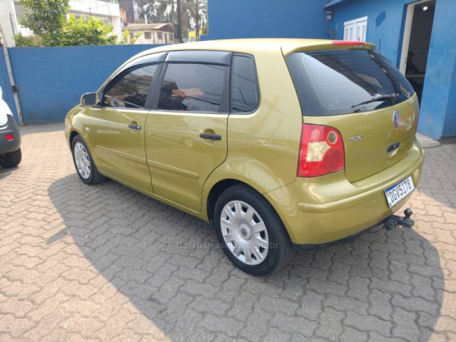 VOLKSWAGEN - POLO - 2002/2003 - Amarela - Sob Consulta