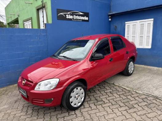 CHEVROLET - PRISMA - 2008/2009 - Vermelha - R$ 27.500,00